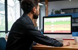 Photo of a grant seeker using Strategic Grants GEMS grants portal to find grants available for nonprofits